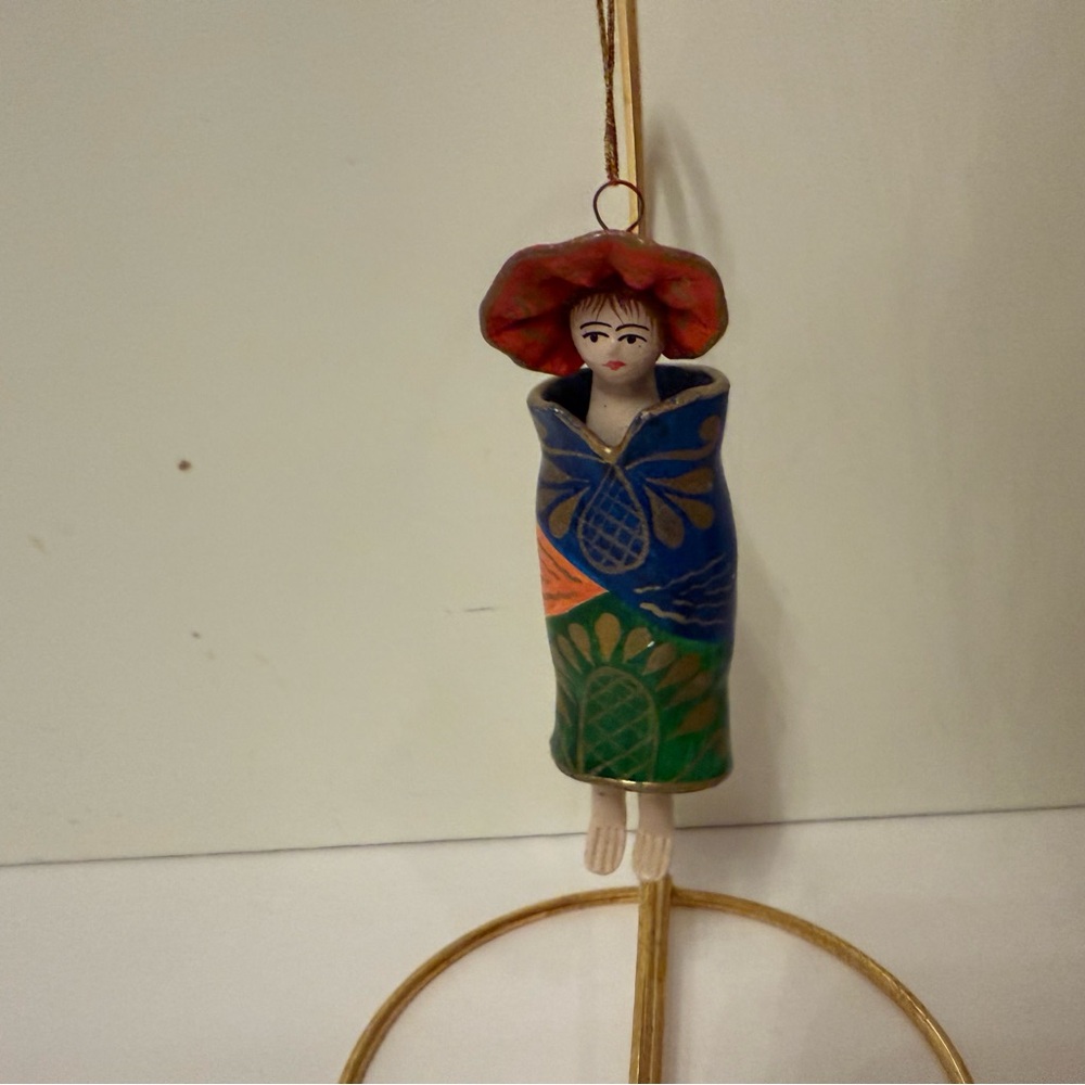 HANDMADE HOLIDAY ORNAMENT CERAMIC DOLL MULTI COLOR HAT WRAP DANGLING FEET